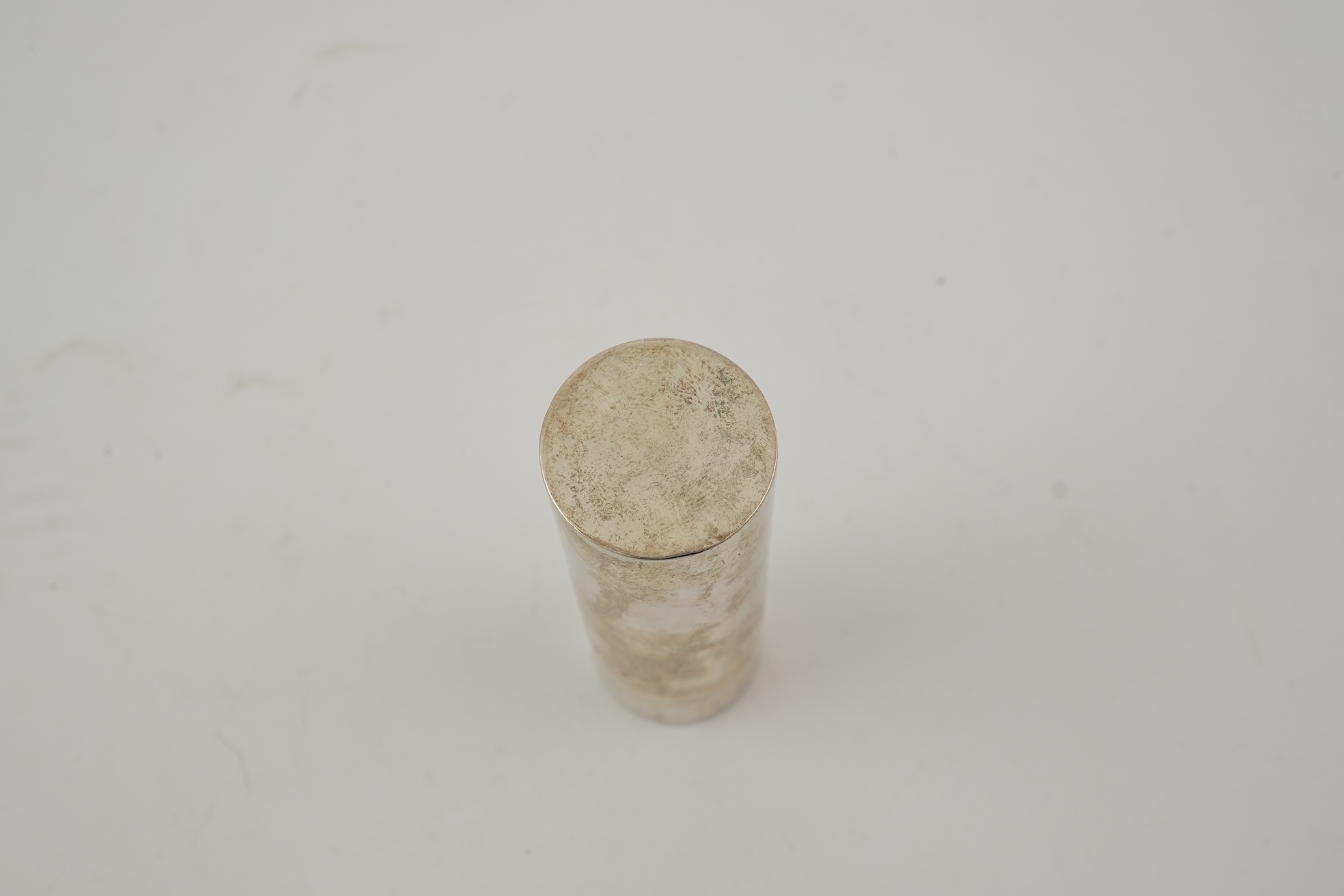 A late Victorian parcel gilt silver tubular coin holder, by Frederic Purnell